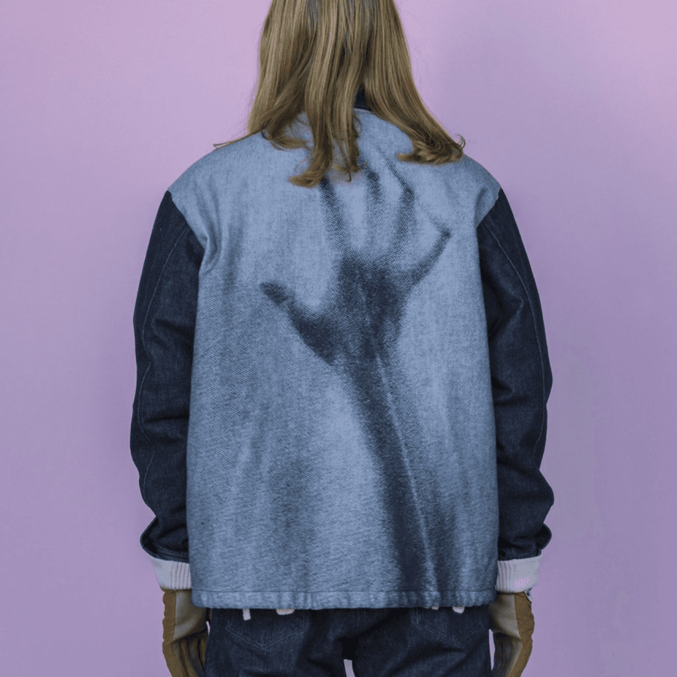 jacket featuring a large hand print across the back